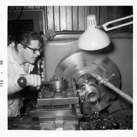 About BW Historical man at tool